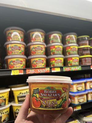 Bobby Salazars Fresh Salsa is the best! Located in the Deli Section where you'll find the fresh dips and hummus.