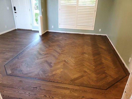 Red oak herringbone and boarder install we did and finished with Rubio monocoat black oilplus2c