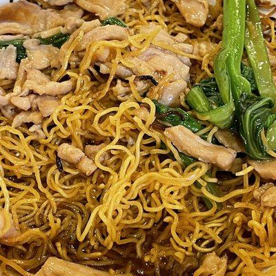 Pan fried noodles chicken with choy sum (tender bok choy)