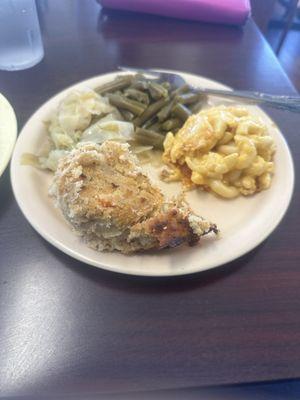 Cornbread dressing, Mac and cheese, green beans, and cabbage!