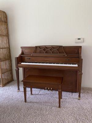 Here is my happy piano in its new spot!