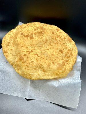 Bhatura (basically a traditional Naan but instead it's fried)