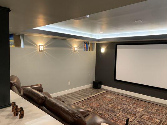 Basement remodeling with a movie theater.