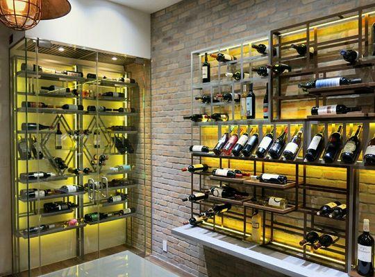 Free stand and refrigerated wine racks imported from Spain. Installed by Miller Construction & Design Inc