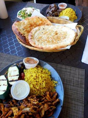 Chicken Shawarma Plate with rice and veggies and a Gyro Plate with rice and a side salad. Comes with Naan bread. So good!!