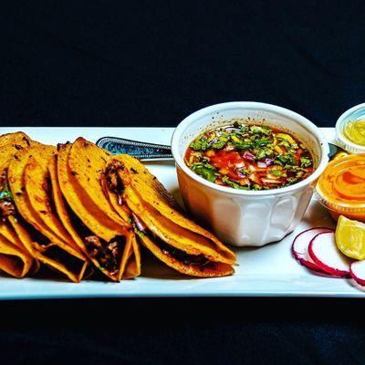 Our famous birria tacos. Shredded beef with our consome! You need this in your life!