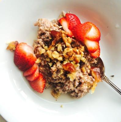 Vegan overnight oats with dates, walnuts and strawberries