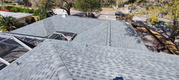 Complicated roof shape is not a problem. Perfectly Installed this New Roof with a lifetime limited warranty