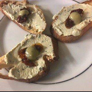 Crostini Appetizer with Ricotta, Sun-dried Tomato, and Pesto