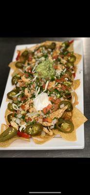 Nachos Superiores 
Grilled Ckn or Steak 
Choice of toppings 
Lettuce 
Pick de gallo 
Sour cream 
Guacamole 
Jalapeños