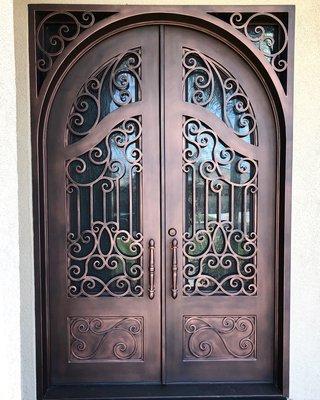 These elegant Entryways Iron Doors increase home value and security, all while giving the home a gorgeous makeover.