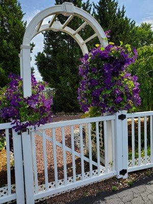 Beautiful gardening and fish pond out front to view