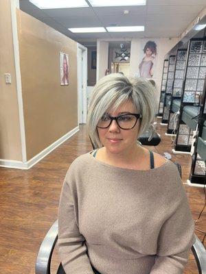 Silver highlights with Asymmetrical short bob