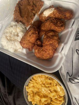 Fried chicken, yams, white rice, and mac and cheese