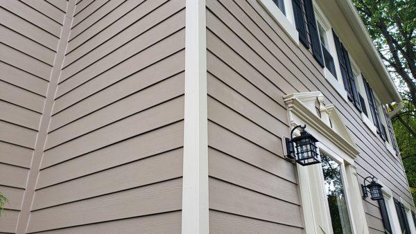 Hardie Plank Khaki Brown siding with Navajo Beige trim