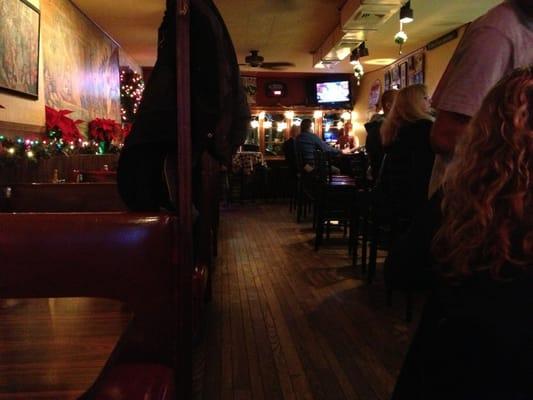 View toward the front of the bar during Christmas season.