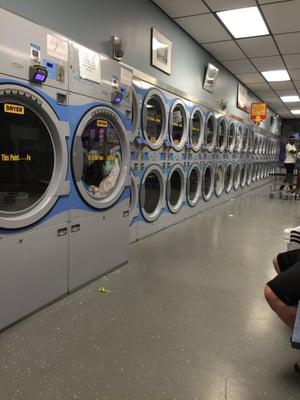 Floors are a little dirty but nothing extreme. Two extra large dryers, several medium ones and several small ones at the end.