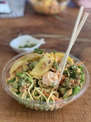 We got Soba/shrimp bowls topped with cucumber Avocado corn jalapeño Oshinko Cilantro carrots & Edamame...