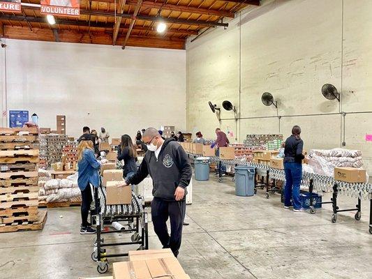 No shortage of volunteers in the foodbank.