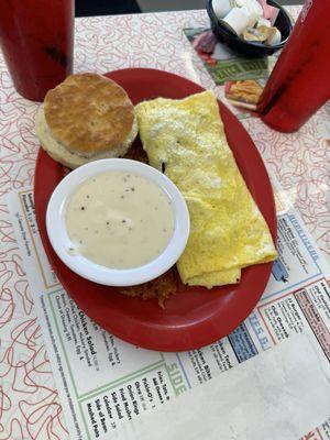 Omelette with country gravy and biscuit