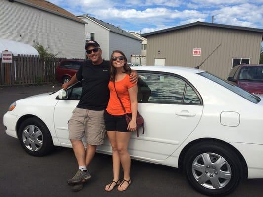 Me and Jamie (owner) in front of my new '06 Toyota Corolla! Love it!