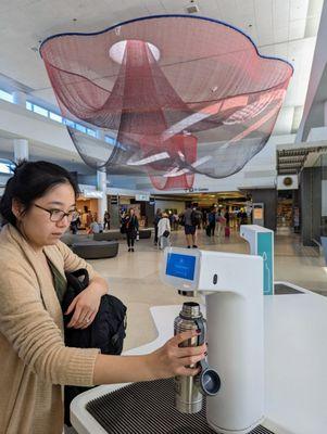 Water filling station inside security.