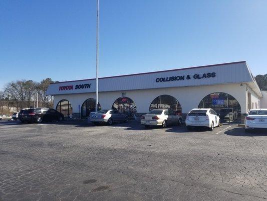 view from the road - front entrance of collision center