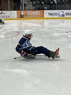 Doing adaptive Sled Hockey!!!