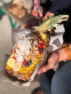 Pineapple Acai Bowl. With strawberries, blueberries, bananas, granola, coconut flakes and agave!