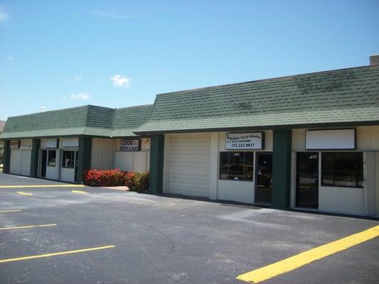 Store frontage : Our store is in the indented area in the middle of the picture where the orange bushes are located.