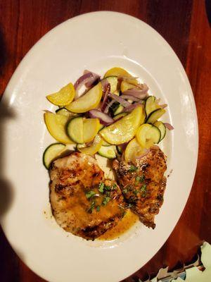 Herb grilled chicken breast w/ sautéed squash, zucchini and onion