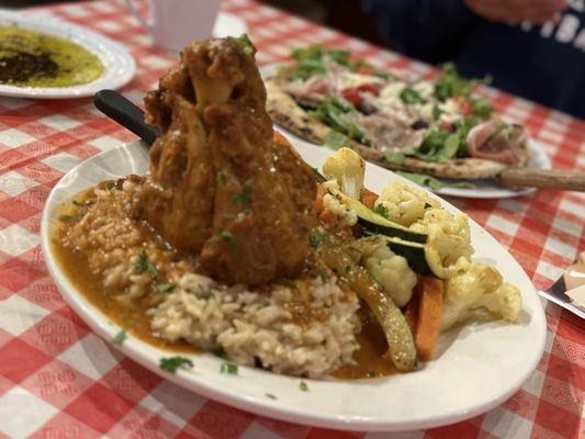 Ossobuco Special: Pork that falls off the bone served with risotto/rice and veggies