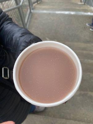 A sad, translucent cup of hot chocolate.