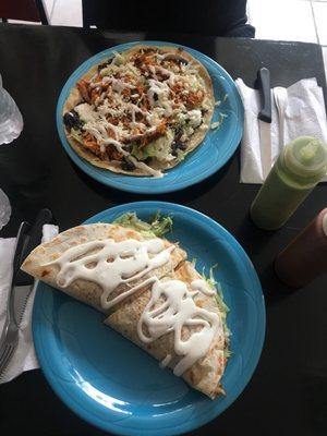 Chicken huarache and chicken quesadilla. Sooooooo good!! The green sauce is the cherry on top.