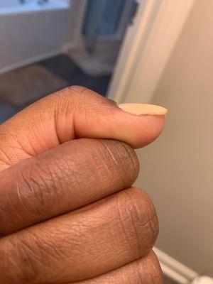 Gel not on nail completely.