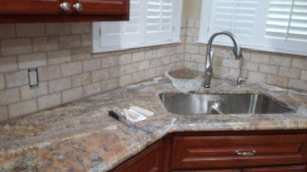 Back splash counter top install.