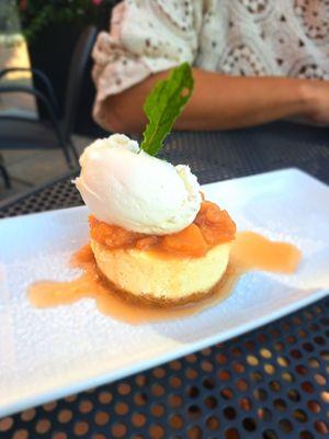 Amaretto Marscapone Cheesecake with white peach/ whiskey compote, and whipped cream. Damn that was Good!