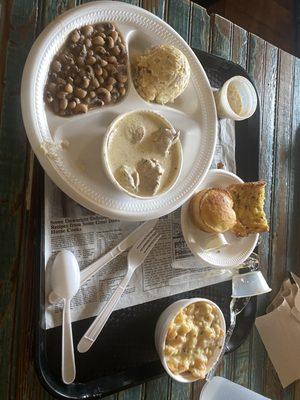 Shrimp scampi, creamed pork loin over dirty rice, black eyed peas,  Cajun potato salad, and corn bread.