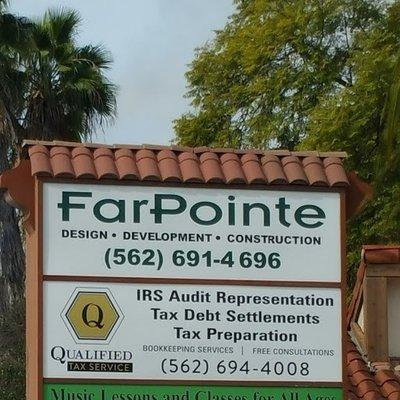 Qualified Tax street sign on Whittier Blvd.