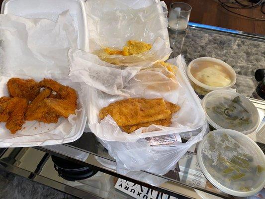 1 entree, 3 sides: catfish filet, dressing, Mac & cheese,corn muffins, chicken wings, mashed potatoes, greens, and green beans.