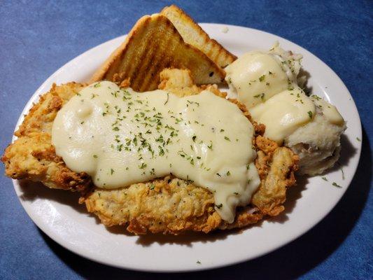 That is a big chicken fried steak. It was very delicious.