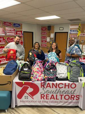 Partnering with Olive Crest for their annual backpack drive.