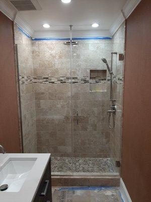 3/8" Frameless Shower Door with in-line panel installed with channel and square hinges/handle