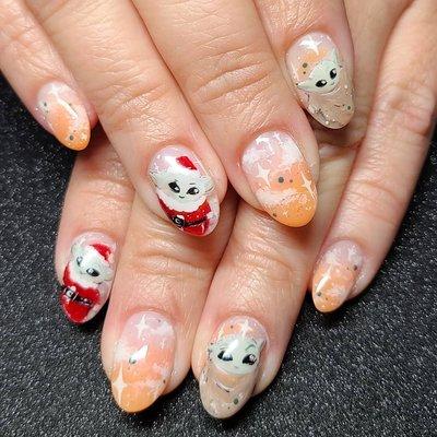 short gel nails with baby grogu Christmas design