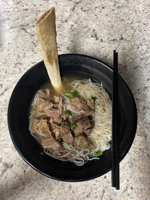 Haft way through my Bone-In Short Rib Noodle Soup pho, broth is what to die for