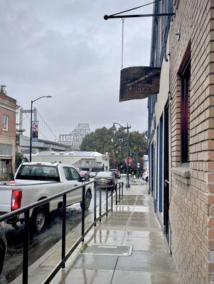 Storefront w/ view of Carquinez Bridge