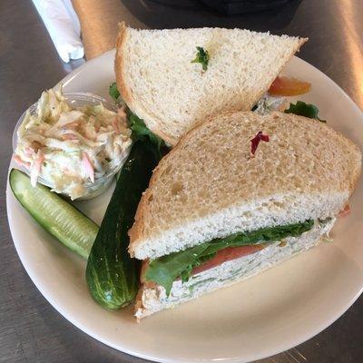 Chicken Salad Sandwich on White.  Came with slaw and three pickles spears.  The sandwich portion was enough to feed all of Manhattan!