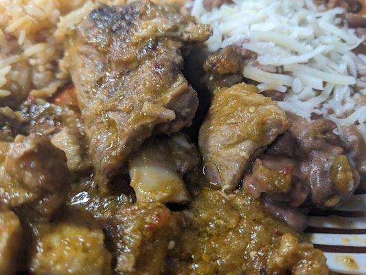 costilla de puerco (pork ribs), in a rich verde sauce