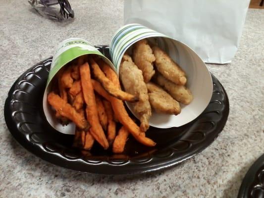 Four piece chicken air strips with sweet potato airfries. Piping hot and tasty!!