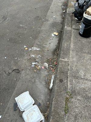 The garbage goes into the storm drain and then into the garbage.